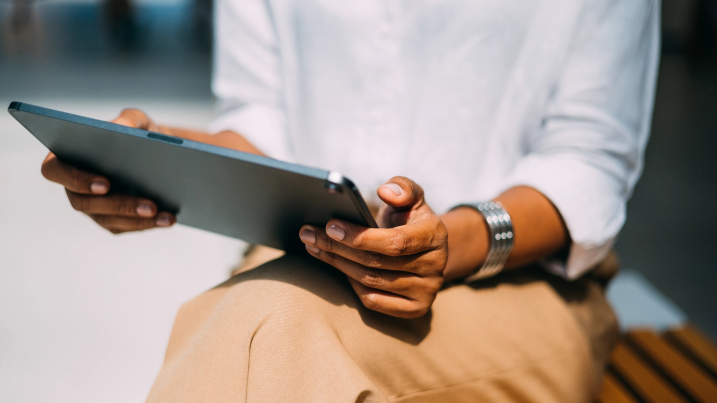 Woman holding a tablet image